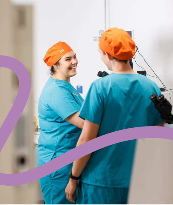 Two nurses working and happy